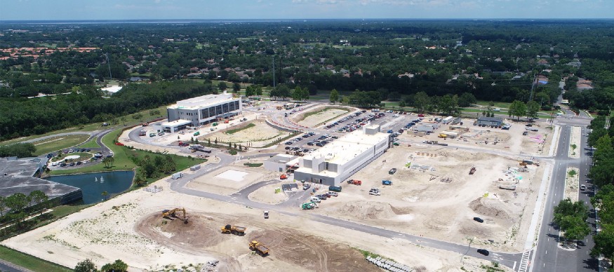 customer-interview-for-jeremy-humphries-2 An aerial shot of a construction site still having its foundation being laid with semi-completed structures